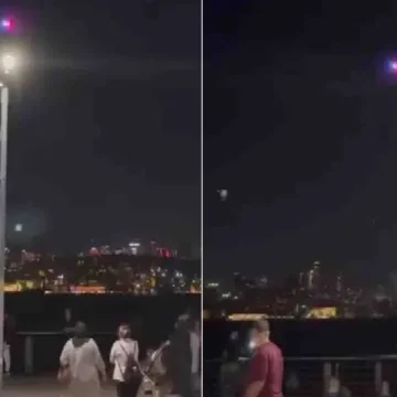 Üsküdar sahilinde dron üzerinden yapılan uyarı anonsunun yer aldığı DHA görüntüsü. Üsküdar sahilinde alkol tüketen gruba anons yapan polis dronu